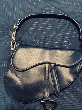 Classic Black Saddle Shoulder Bag with Gold Accent
